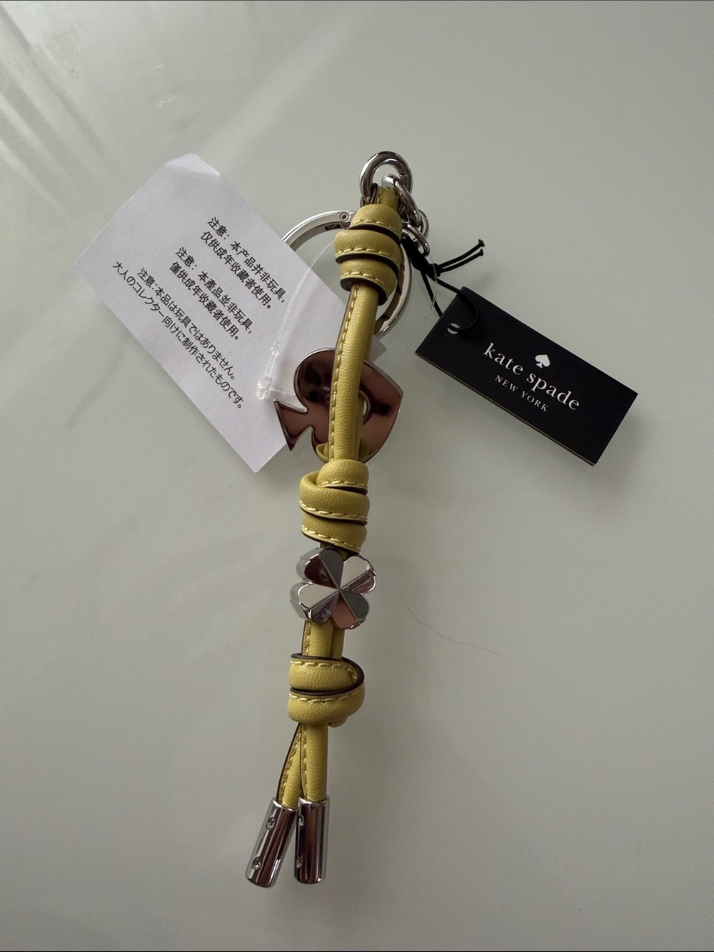 kate spade Yellow Leather Knot Tassel Key & Card Holder with Clover Accent - Picture 2 of 2